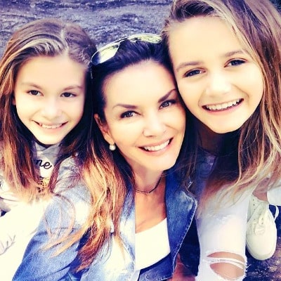 Photo of Kirsten Kutner with her daughters. 